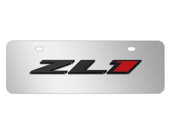 Imagen iPick para Chevrolet Camaro ZL1 con logotipo 3D, placa de matrícula de acero inoxidable de tamaño medio, cromada, de aspecto europeo, de 30 x 10,8 cm, con licencia oficial.
