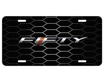 Imagen iPick para Chevrolet Camaro 50.º aniversario con gráfico de rejilla de malla, placa de matrícula de metal de aluminio especial, con licencia oficial