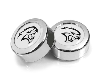 Imagen iPick para Dodge SRT Hellcat con logotipo de cúpula blanca sobre cromo, juego de dos cubiertas para tornillos de marco de placa de matrícula de plástico ABS, con licencia oficial
