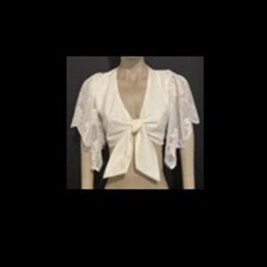 May include: A cream-coloured cropped top featuring a deep V-neckline and a front tie closure. The garment has short, flared sleeves made of a delicate, semi-sheer floral lace fabric that contrasts with the solid, smooth material of the bodice.