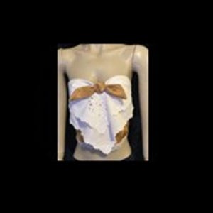 May include: A strapless white eyelet fabric top featuring a tan-coloured bow detail at the centre of the neckline. The garment has a scalloped hemline and a layered appearance, with the tan fabric visible beneath the white eyelet material.