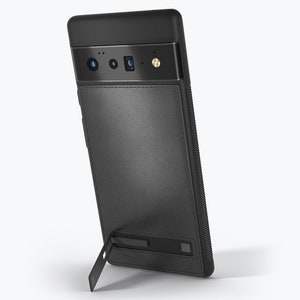 May include: A black smartphone with a leather back and a built-in kickstand. The phone has a triple camera system on the back.