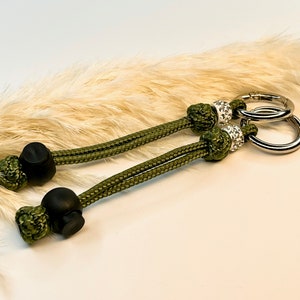 Kotbeutelhalter für Leine aus Nylon | oliv grün runder Karabiner wasserfest Paracord Kotbeutelspender Glitzer Hundekothalter Hunde Hundekot