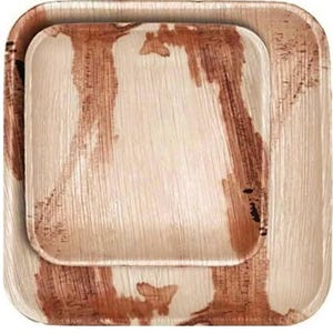 May include: Two square plates made from natural materials. The larger plate has rounded corners and a slightly raised edge. The smaller plate fits inside the larger one. The plates have a light tan color with brown streaks and patterns.