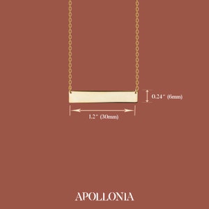 May include: Gold bar necklace with a 1.2 inch (30mm) long bar and a 0.24 inch (6mm) width. The necklace is made of gold chain.
