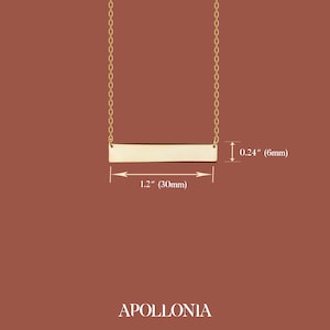 May include: Gold bar necklace with a 1.2 inch (30mm) long bar and a 0.24 inch (6mm) width. The necklace is made of gold chain.