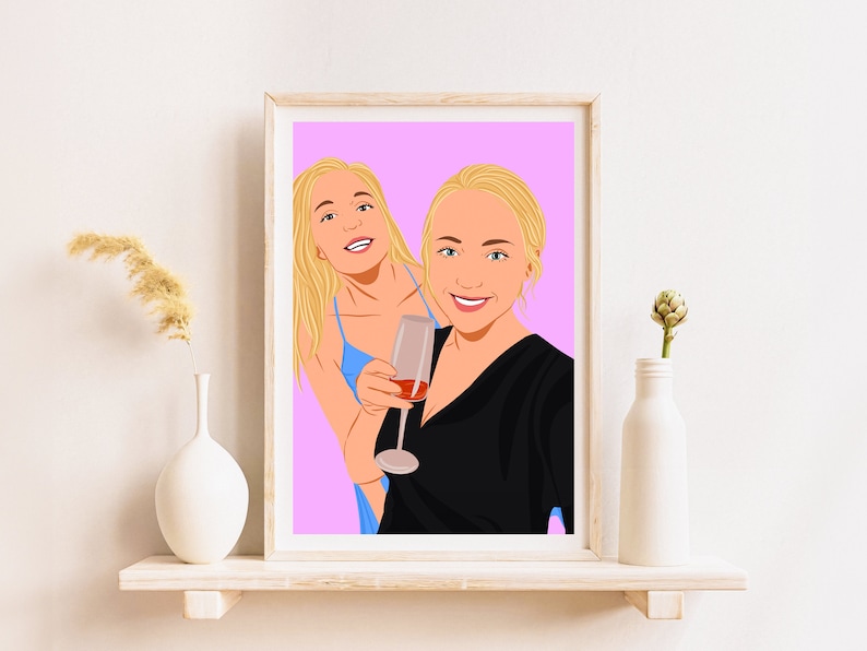 May include: A framed illustration of two women with blonde hair, one holding a glass of wine. The background is a light pink color.