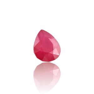 May include: A pear-shaped, faceted gemstone with a deep, vibrant pinkish-red color. The stone features a polished surface with multiple geometric facets that catch the light, creating a brilliant appearance against a plain white background.