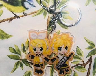 Yellow singing computer program twins acrylic keychain