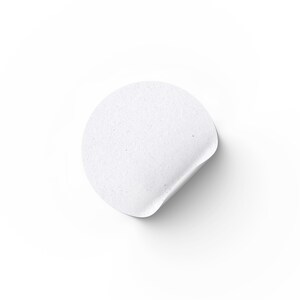 May include: A white round sticker with a curled edge.