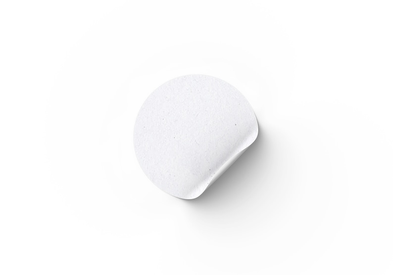May include: A white round sticker with a curled edge.