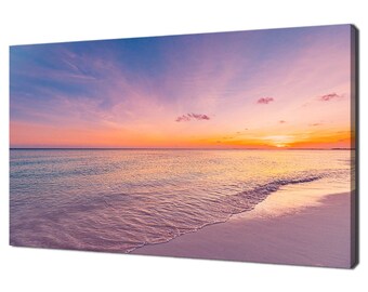 May include: A panoramic view of a beach at sunset. The sky is a vibrant mix of pink, orange, and purple hues. The water is a calm, turquoise blue, with gentle waves lapping at the shore. The sand is white and powdery, creating a serene and tranquil scene.