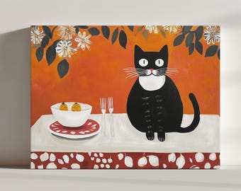 May include: A black cat with a white bib sits at a table with a bowl of orange fruit, two forks, and a red and white patterned plate. The table has a white tablecloth with a red and white patterned border. The background is a bright orange wall with a leafy green vine with white flowers.