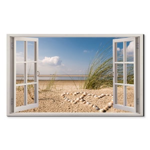 May include: A white window frame with an open window looking out at a beach scene. The beach is sandy with a heart shape made out of seashells. The sky is blue with white clouds.