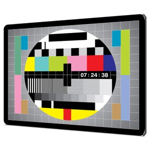 May include: A black and white television test pattern with coloured bars and a digital clock displaying 07:24:38. The pattern is surrounded by a grey grid.