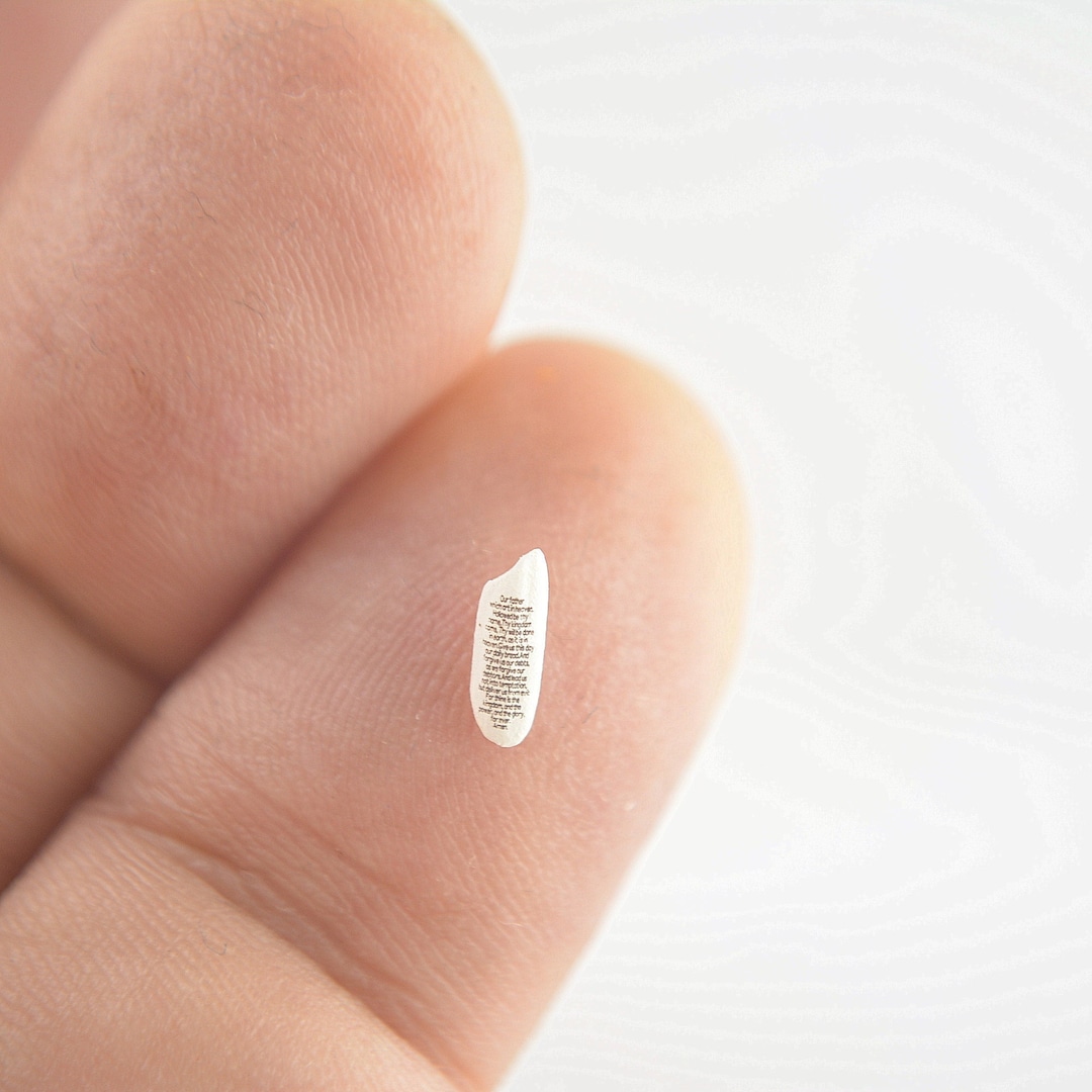 The Lord's Prayer Engraved on a Grain of Rice: Genuine Diamond Accent ...