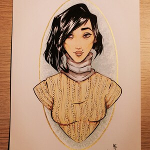 May include: A digital illustration of a woman with black hair wearing a beige knitted sweater and a white turtleneck. The illustration is framed in a gold oval and has the artist's signature "Le Cho Huan" in the bottom right corner.