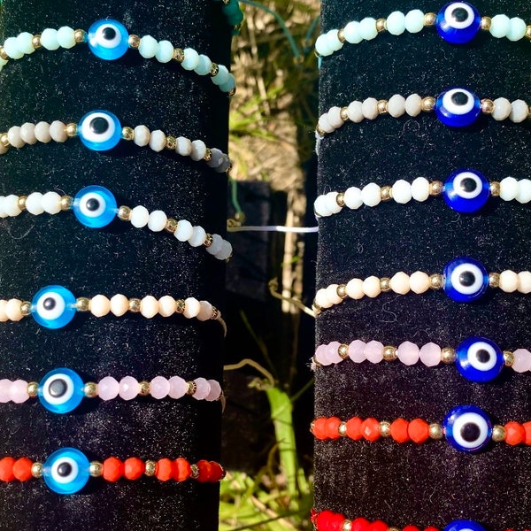 Cord bracelet made with glass beads and evil eye bead