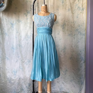 audrey hepburn blue dress Audrey Hepburn inspired retro light blue pastel blue floral printed short sleeve 1950's inspired midi full swing dress main image 0