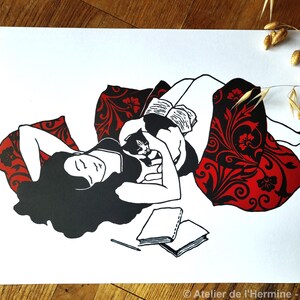 May include: Black and white illustration of a person reclining with a cat and books. The person is lying on a red patterned blanket. Two books and a pencil are on the white surface. The image is signed "Atelier de l'Hermine - Avril 2025".