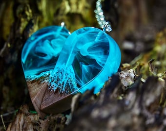 Heart necklace for couples with aurora borealis inside. Two parts for bride and groom. An ideal gift for Valentine's Day