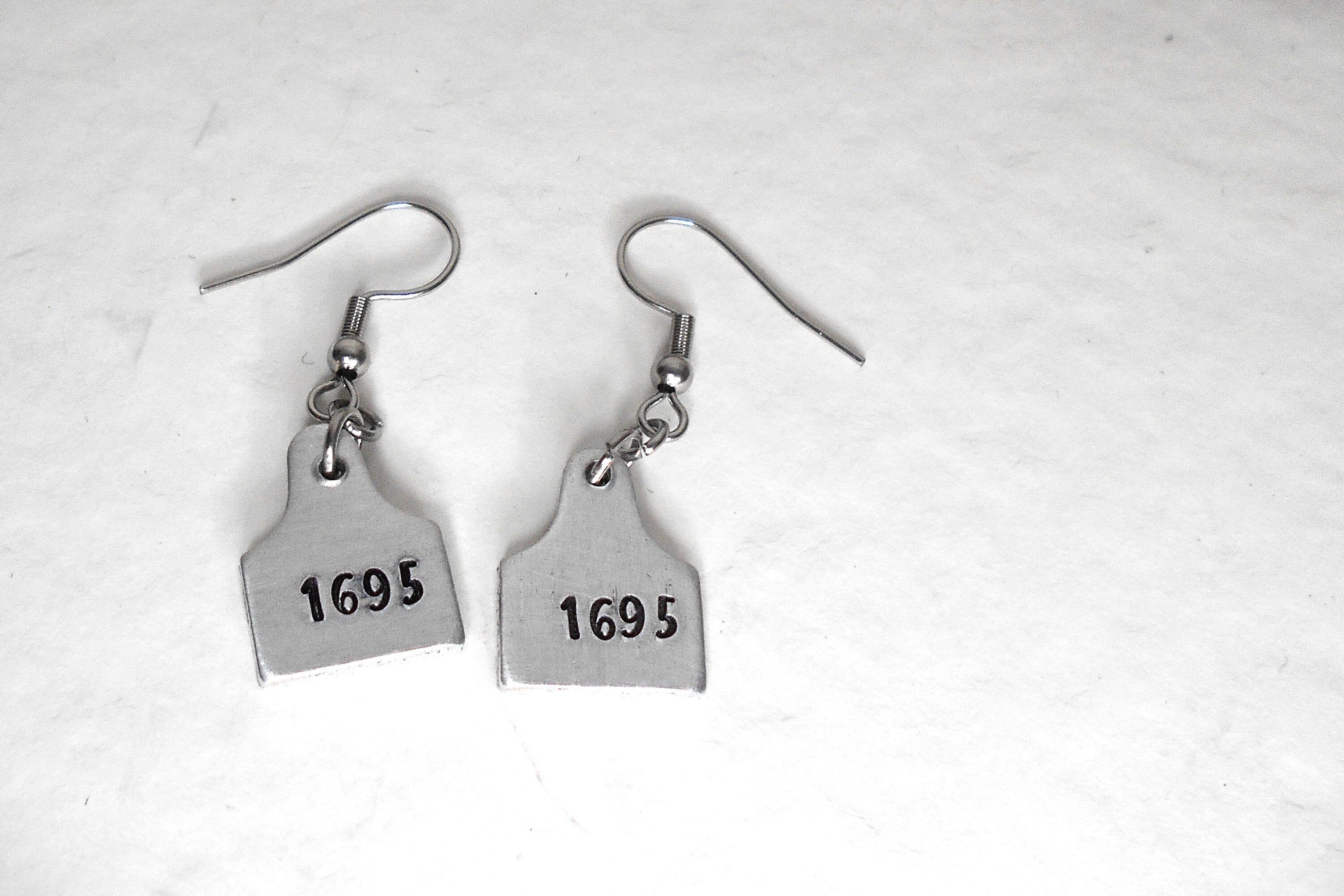 Aggregate more than 202 cow tag earrings best