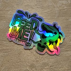 Little Shop of Horrors Broadway musical inspired FEED ME Holographic Sticker - Audrey II laptop sticker, Audrey 2 water bottle sticker