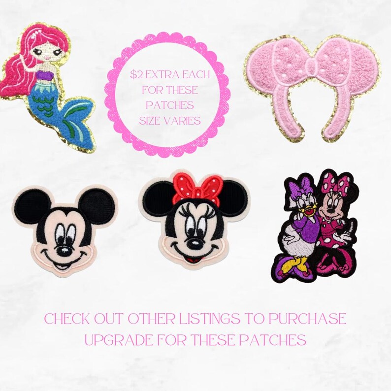 May include: Collection of colorful embroidered patches featuring a mermaid, Mickey Mouse, Minnie Mouse, and a pair of character ears. The patches have gold glitter accents and are on a white background. Text on the image says "$2 EXTRA EACH FOR THESE PATCHES SIZE VARIES".