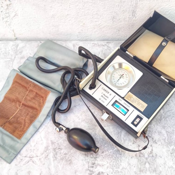 Vintage medical instrument, Vintage sphygmomanometer, Old medical accessory, Blood pressure meter, Vintage medical device, Old sphygmomanometer