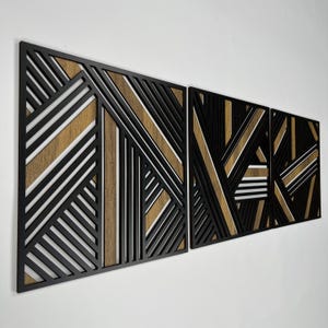 May include: Three black and brown geometric wall panels with a modern design. The panels are made of wood and have a layered effect.