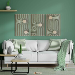 May include: A living room scene with a white sofa, green and white striped pillows, and a green throw blanket. Three wooden wall art pieces with a wavy design hang above the sofa. Two small wooden tables with black metal legs are in front of the sofa.