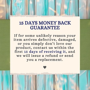 May include: A square off-white card with torn edges featuring dark blue text that reads 15 DAYS MONEY BACK GUARANTEE. Below this, the text explains a 15-day return policy for defective or unwanted items, ending with a small black heart icon.