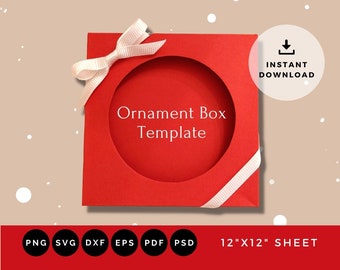 May include: A red square box template with a circular cutout for a bauble. The box is decorated with a white ribbon and bow. The text "Ornament Box Template" is printed on the box. The image includes the text "INSTANT DOWNLOAD" and "12"X12" SHEET".
