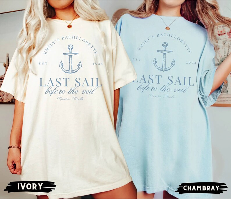 May include: Two oversized t-shirts with a nautical theme. The shirts are in ivory and light blue. The design features an anchor, the text "Emily's Bachelorette", "EST 2024", "Last Sail Before the Veil", and "Miami, Florida".