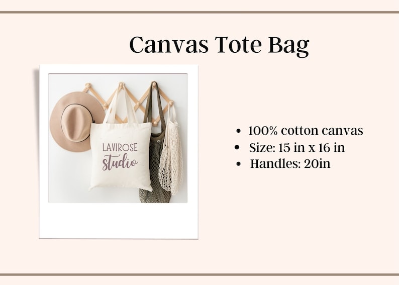 May include: A white canvas tote bag with the text "LAVIROSE studio" printed in purple. The bag is hanging on a wooden rack with a brown hat and a green mesh bag. The bag is 15 inches by 16 inches with 20-inch handles.