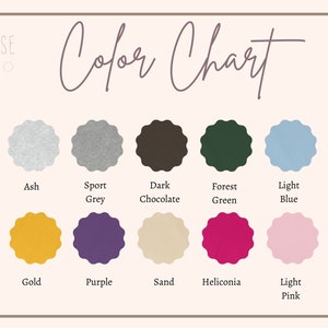 May include: Color chart with 10 different color swatches. The colors are: Ash, Sport Grey, Dark Chocolate, Forest Green, Light Blue, Gold, Purple, Sand, Heliconia, and Light Pink.