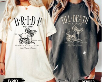May include: Two oversized t-shirts with a skull and margarita graphic. The ivory shirt says "Bride or die" and the gray shirt says "Till Death do us party". Both shirts have the text "Ashley's Bachelorette Las Vegas, Nevada" and the year "2024".