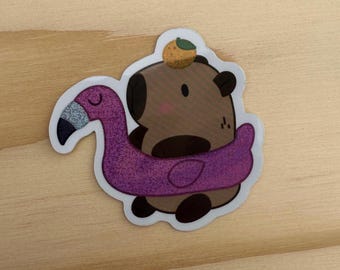 Capybara in a float sticker
