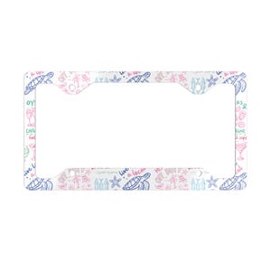 May include: White license plate frame with a repeating pattern of sea turtles, surfboards, starfish, and cocktail glasses in blue, pink, and green. The words "Off Duty" and "Live like a local" are also included.