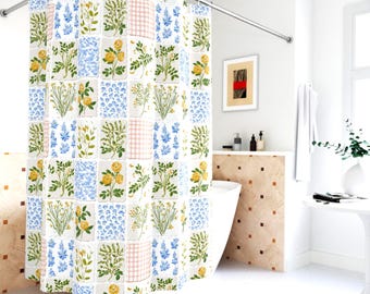 May include: A floral shower curtain with a patchwork design. The curtain features squares with yellow roses, blue flowers, and green foliage on a white background. Some squares have a pink gingham pattern. A curved shower rod is installed.