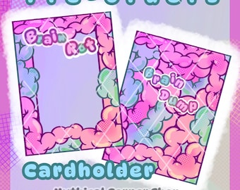 May include: Two cardholders with a pink, blue, and green cloud design. One cardholder has the text "Brain Rot" and the other has "Brain Dump". The word "Cardholder" is written in blue, and "Pre-orders" is at the top.