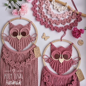 Warm and Dark Pink Macrame Owls are laying on the white table - wooden butterfly between them. Pink verion of Macrame Leaf Half Mandala is laying on the table above the owls.
On the left is logo of Poly Tusal Handmade.