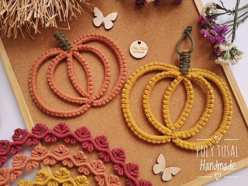 May include: Two macrame pumpkin wall hangings, one in orange and one in yellow, with a brown corkboard background. The text "POLY TUSAL Handmade" is visible at the bottom of the image.