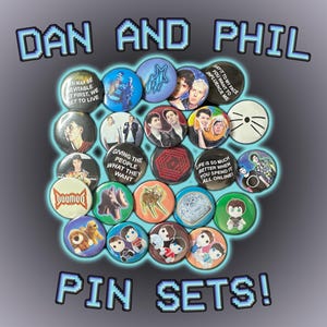 May include: A selection of colourful pin sets with diverse designs and text. The pins display images of people, the text "Dan and Phil" and "Pin Sets!", and other graphics. The background is a gradient of grey and blue.