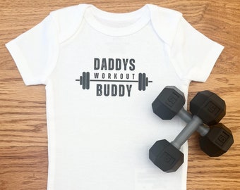 Set of &quot;Daddys Workout Buddy&quot; Infant Bodysuit and 2 Dumbbell Rattles. Great gift for exercise enthusiasts and baby showers!