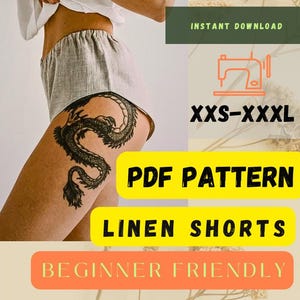 May include: Image of a person wearing a white linen top and gray linen shorts. The image includes text that says "PDF Pattern", "Linen Shorts", and "Beginner Friendly". The size range is XXS-XXXL. A black dragon tattoo is visible on the person's thigh.