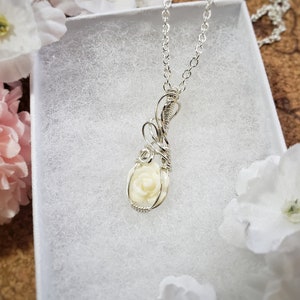 White stone rose pendant
