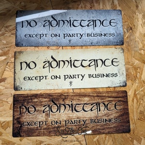 May include: Three rustic metal signs with the text "no admittance except on party business" in a decorative font. The signs are in different colors: gray, white, and brown.