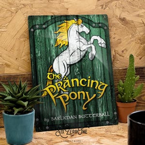 May include: A green wooden sign with a white horse rearing up on its hind legs. The sign reads "The Prancing Pony by Barliman Butterball" in yellow lettering.