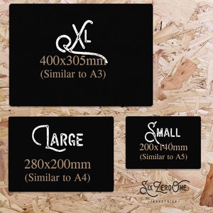 May include: Three black rectangular signs with white text and measurements. The largest sign reads "XL" and "400x305mm (Similar to A3)". The middle sign says "LARGE" and "280x200mm (Similar to A4)". The smallest sign says "SMALL" and "200x140mm (Similar to A5)".